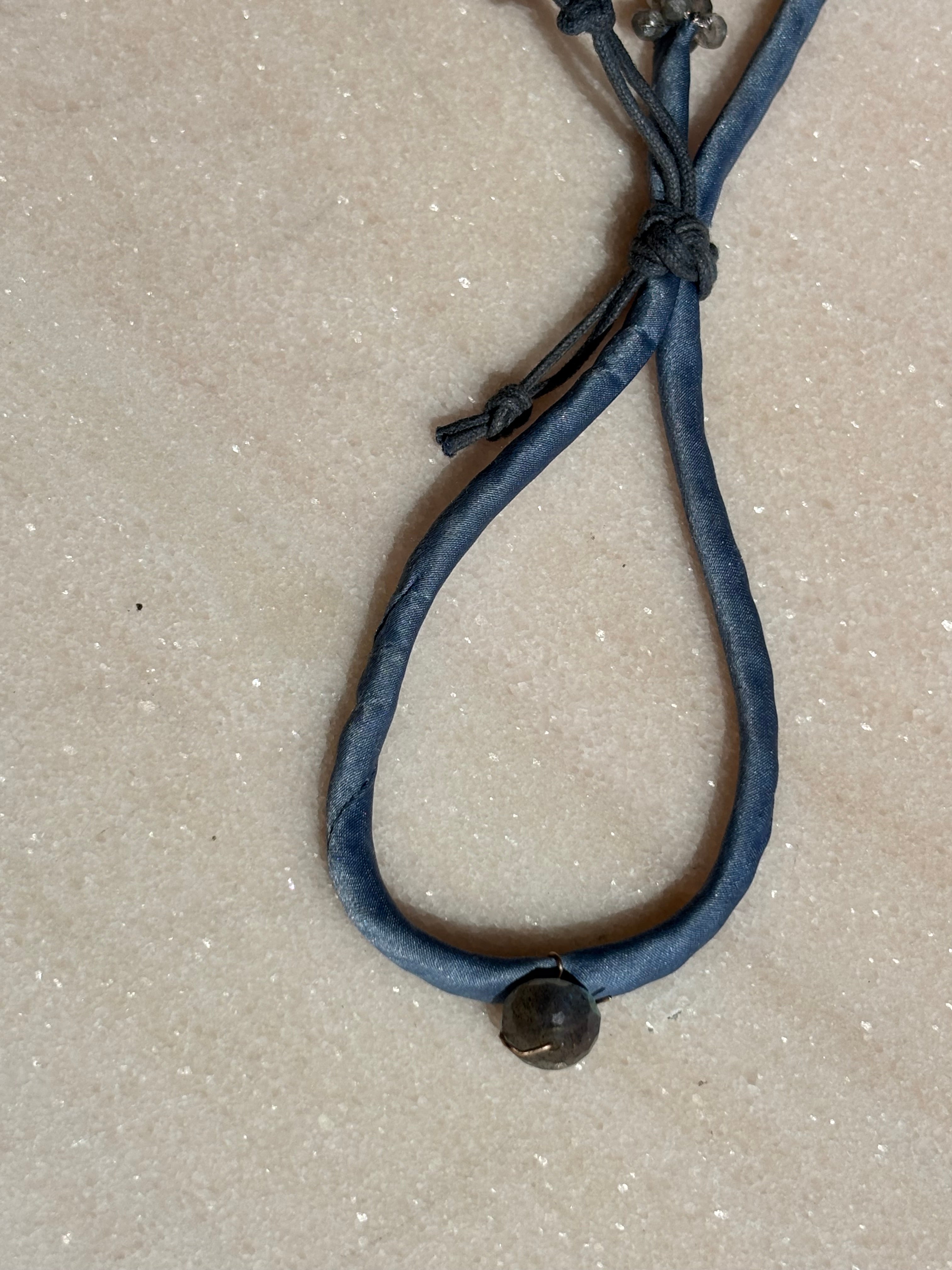 Perfect blue jeans color silk bracelet labradorite center bead blue cord sliding button adjustable labradorites finishing beads silver thread by boussidan