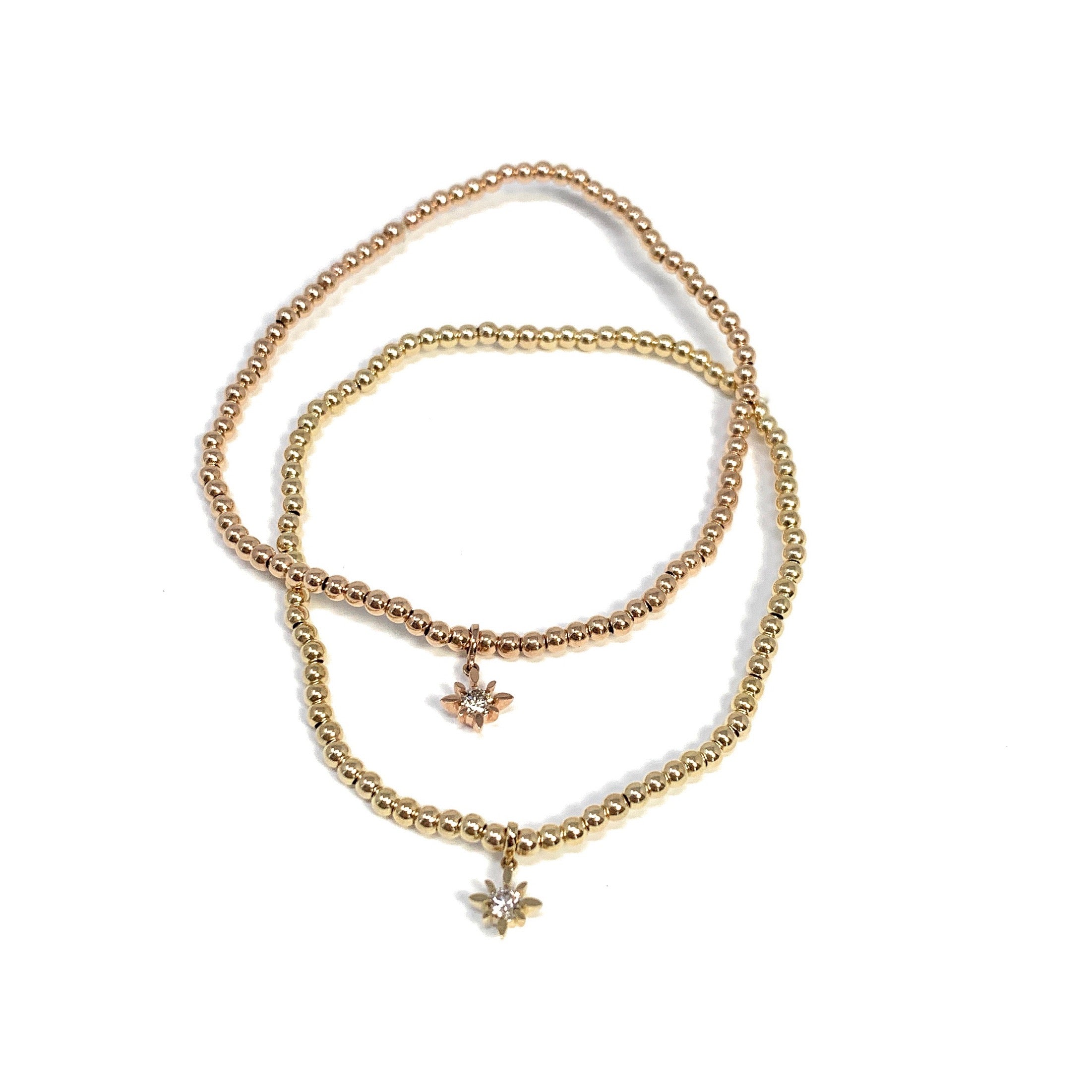 14k gold 2.2mm beads with diamond star charm by Boussidan