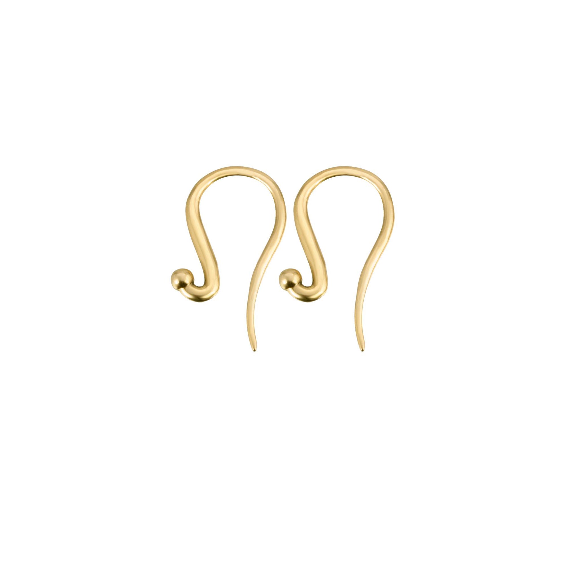 Closeup of two 14k gold diamond-encrusted ear wire by Boussidan