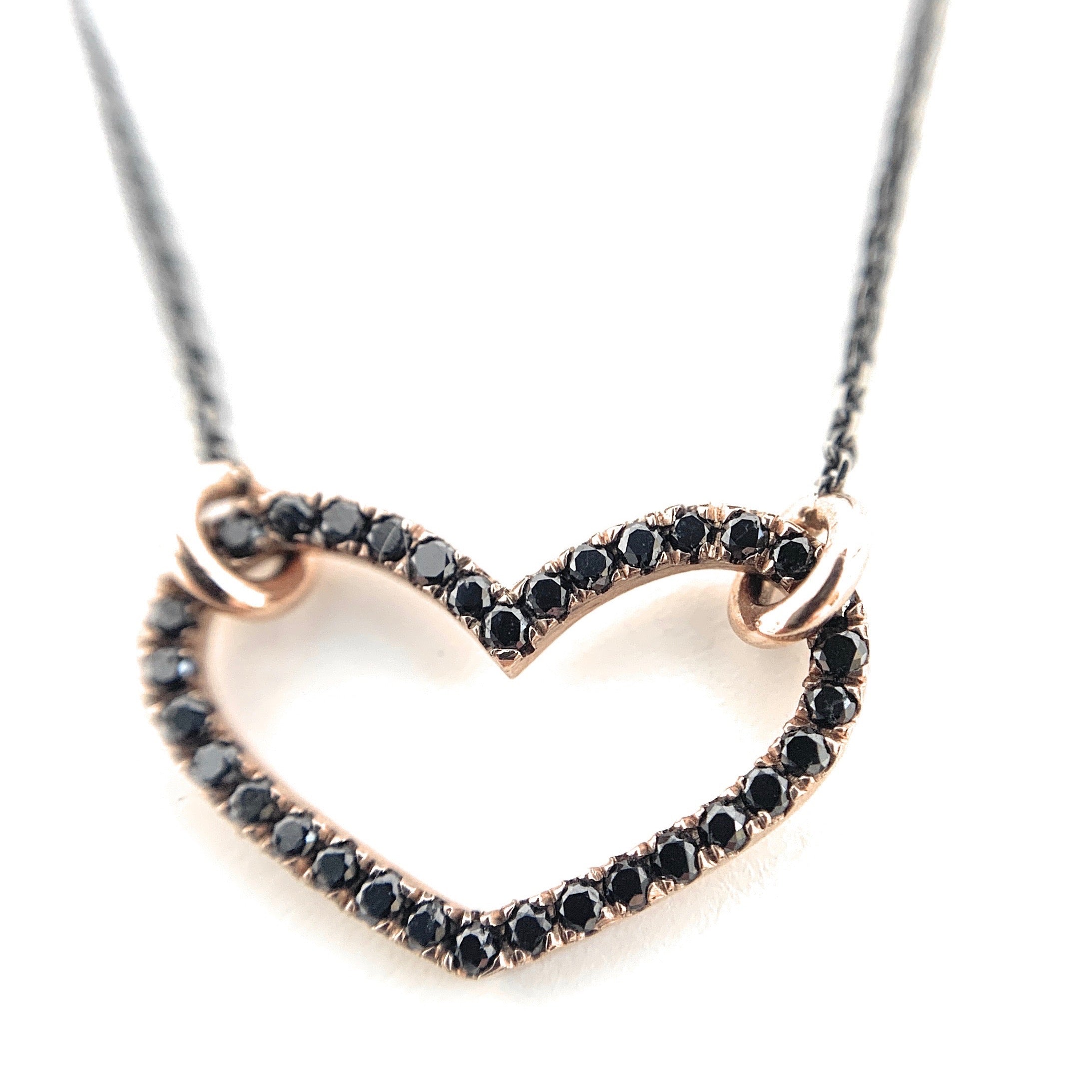 14k rose gold midnight heart necklace closeup by boussidan