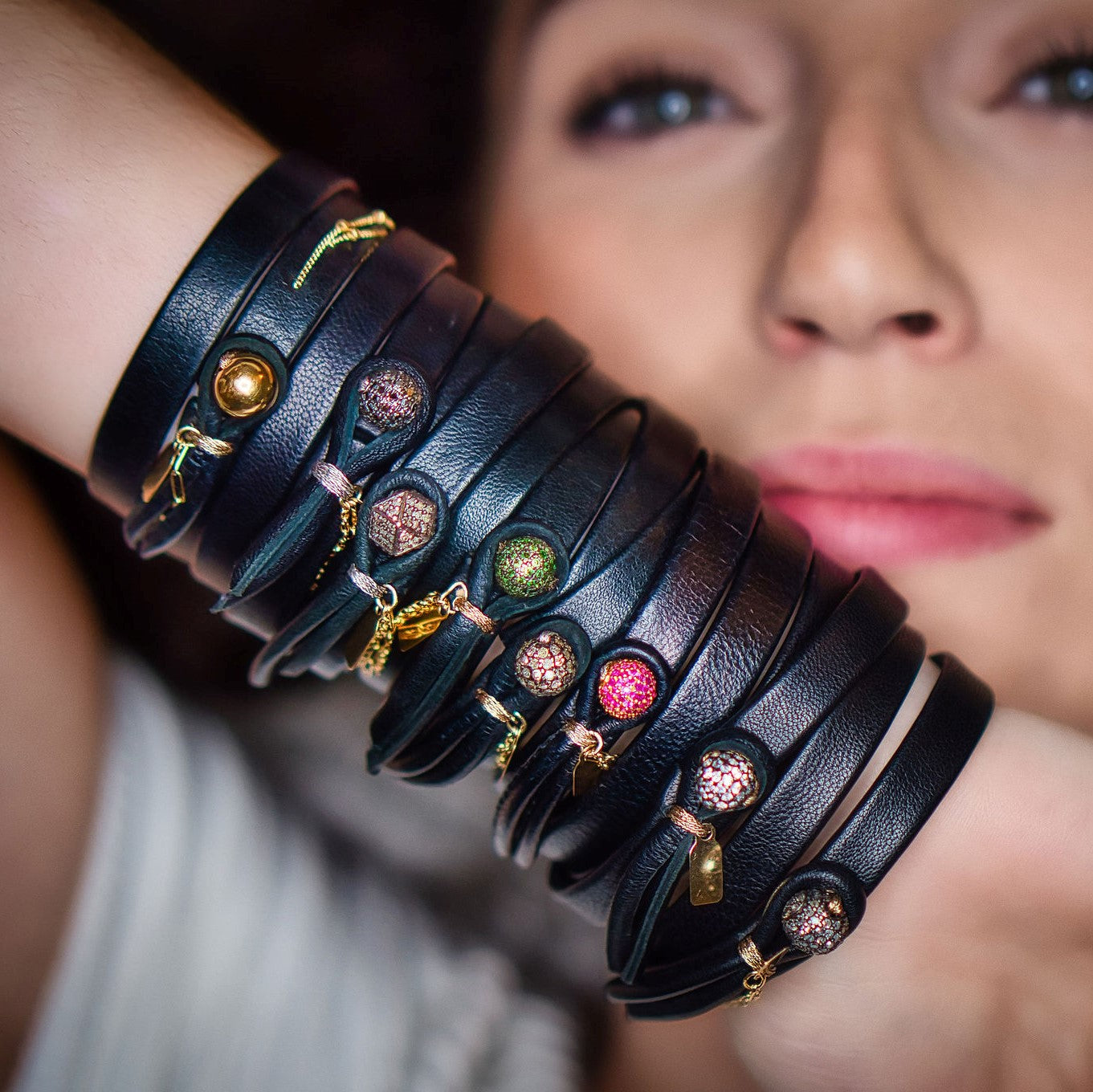 The Noir double wrap leather bracelet on wrist, showcasing feminine luxury