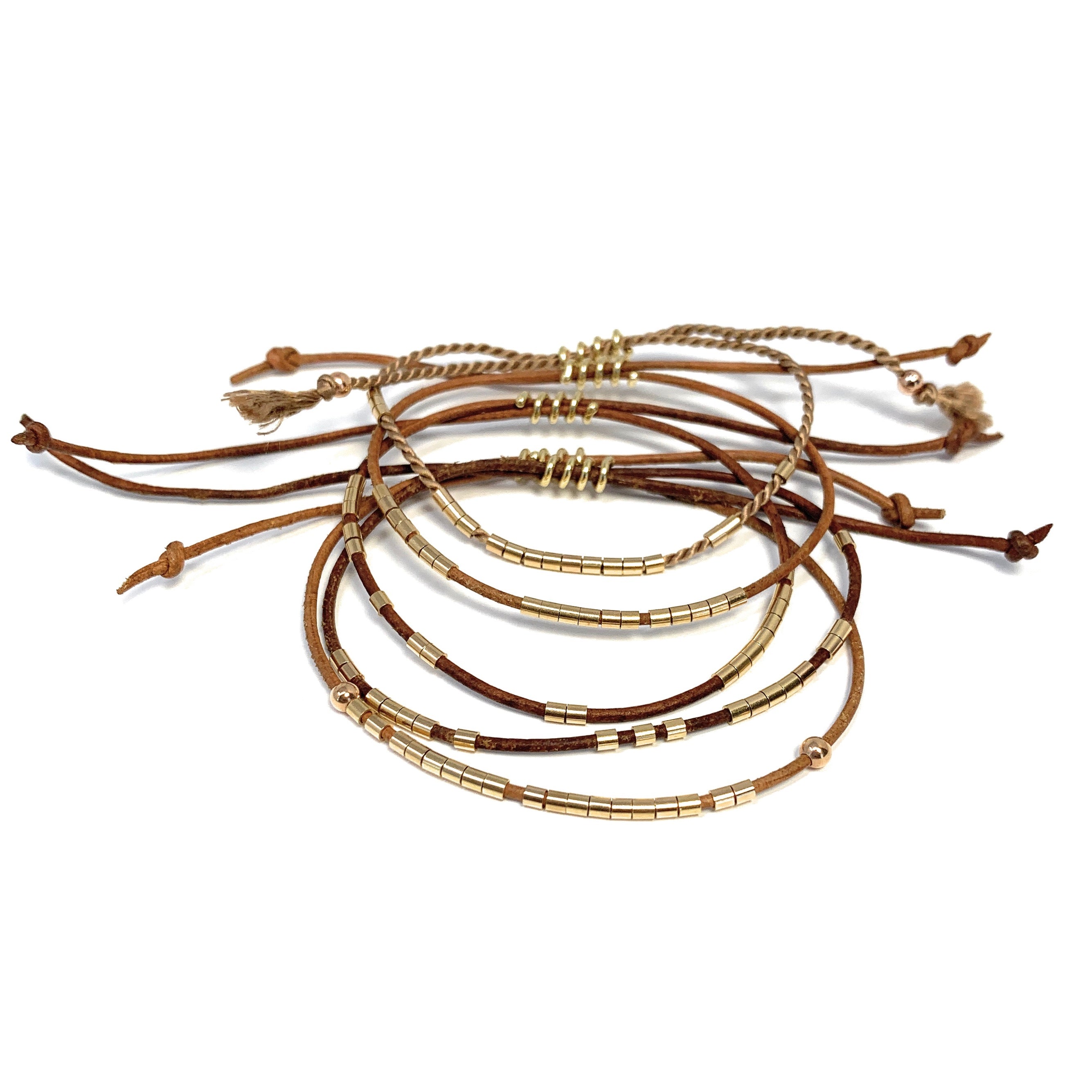 14k gold twist closure on leather bracelet by Boussidan