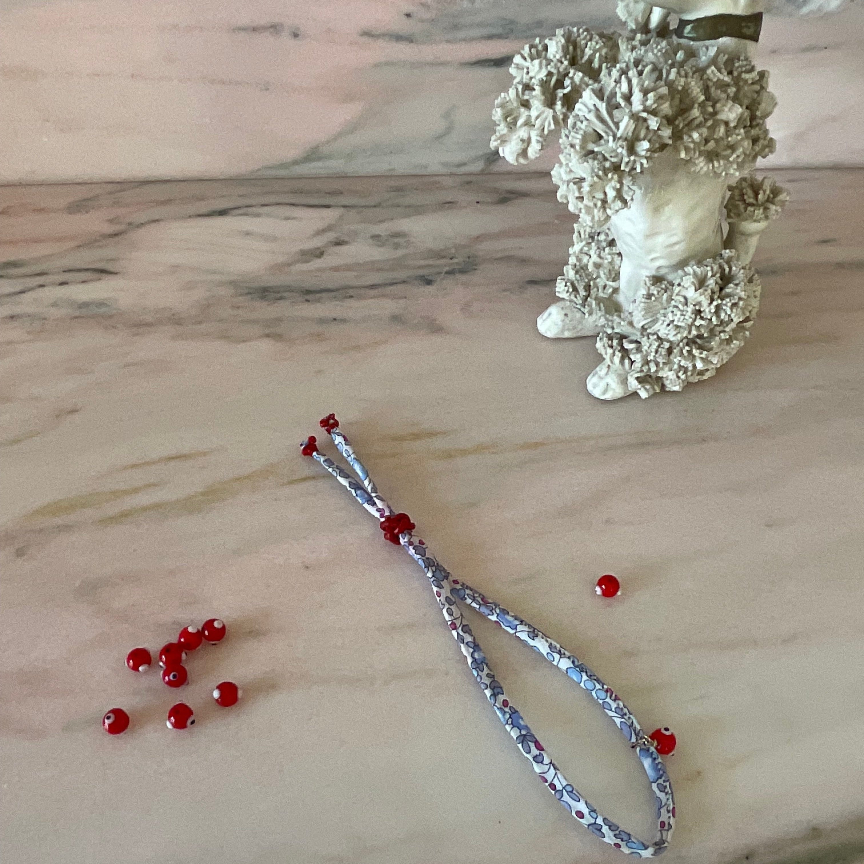 evil eye leather cord red spinel 