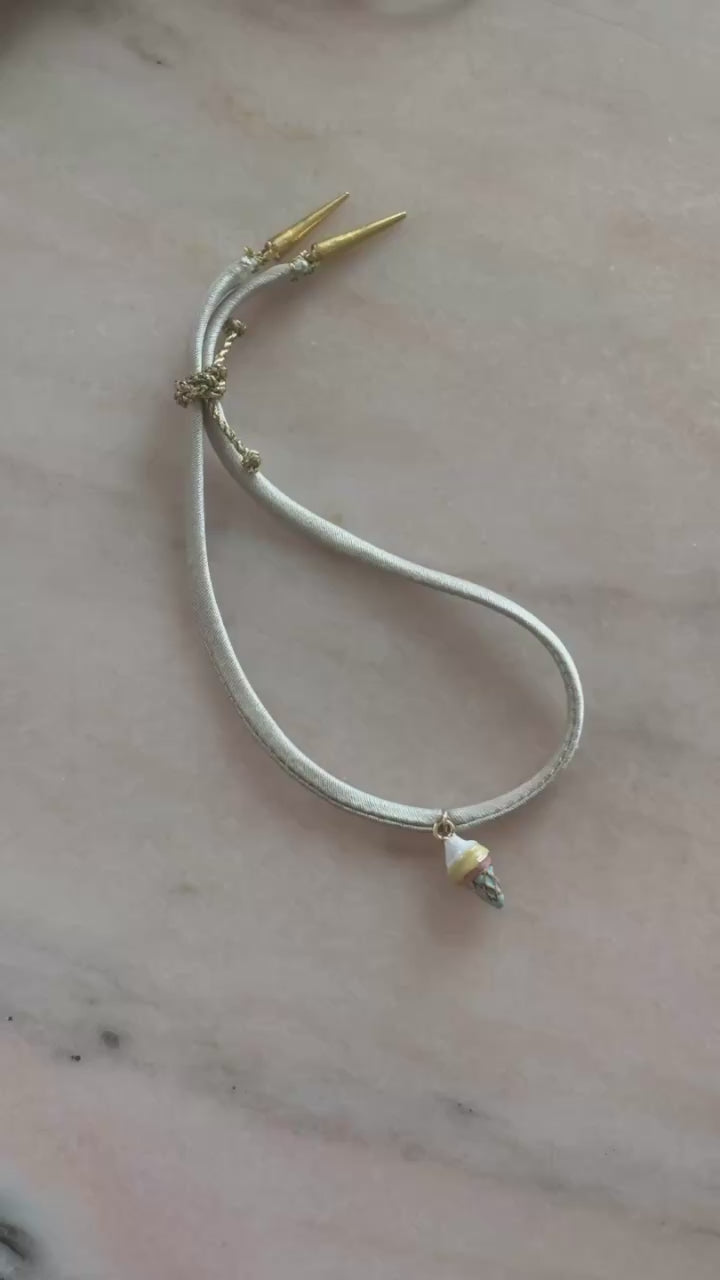 Ivory silk bracelet with ice cream cone charm video by Boussidan