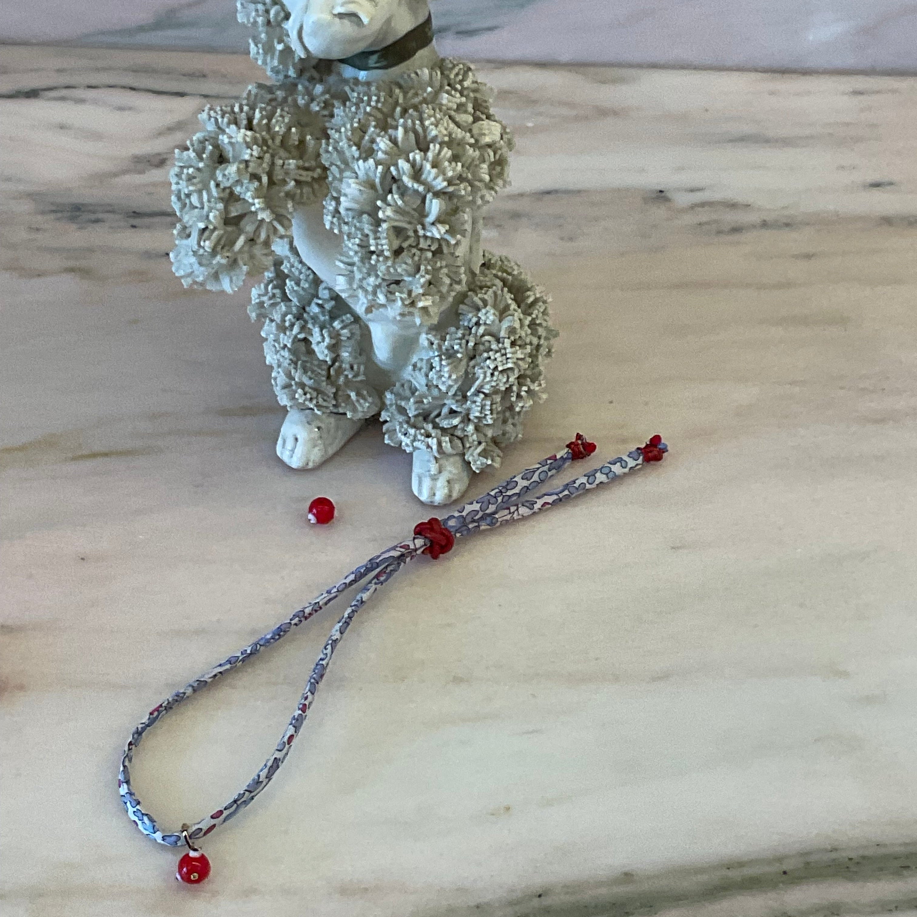 Red Eye Bloom Wild-Flowers Liberty Bracelet with red-white-blue floral cord and 3D eye charm by Boussidan