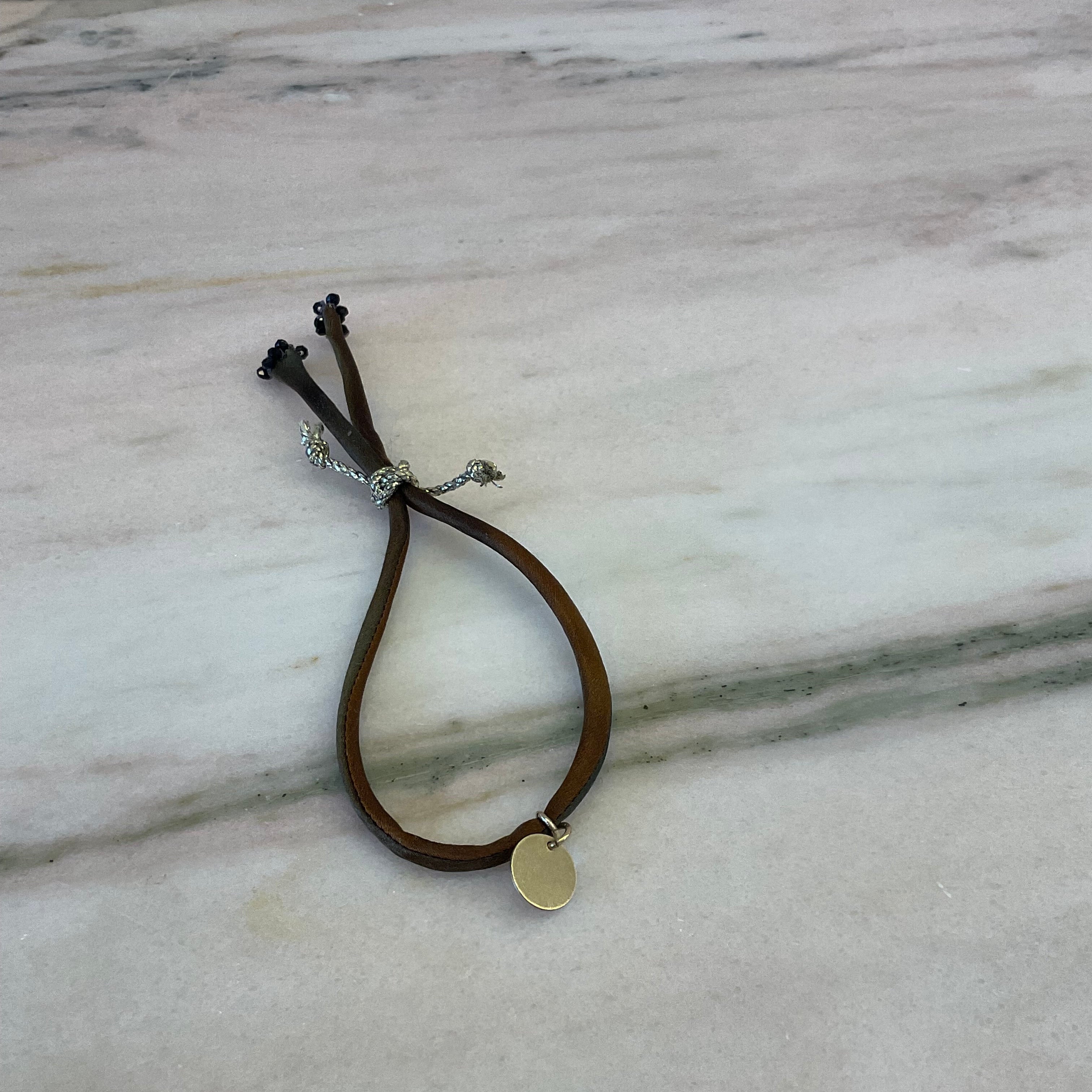 Ombre silk bracelet with black spinel beads by Boussidan.
