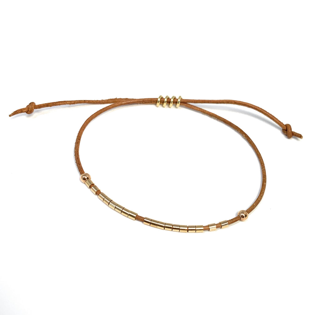 GOLD TUBE WRAP LEATHER BRACELET - Boussidan
