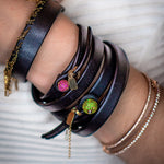 Load image into Gallery viewer, Empress Double Wrap Lambskin Bracelet with 14k gold ruby ball closure on wrist
