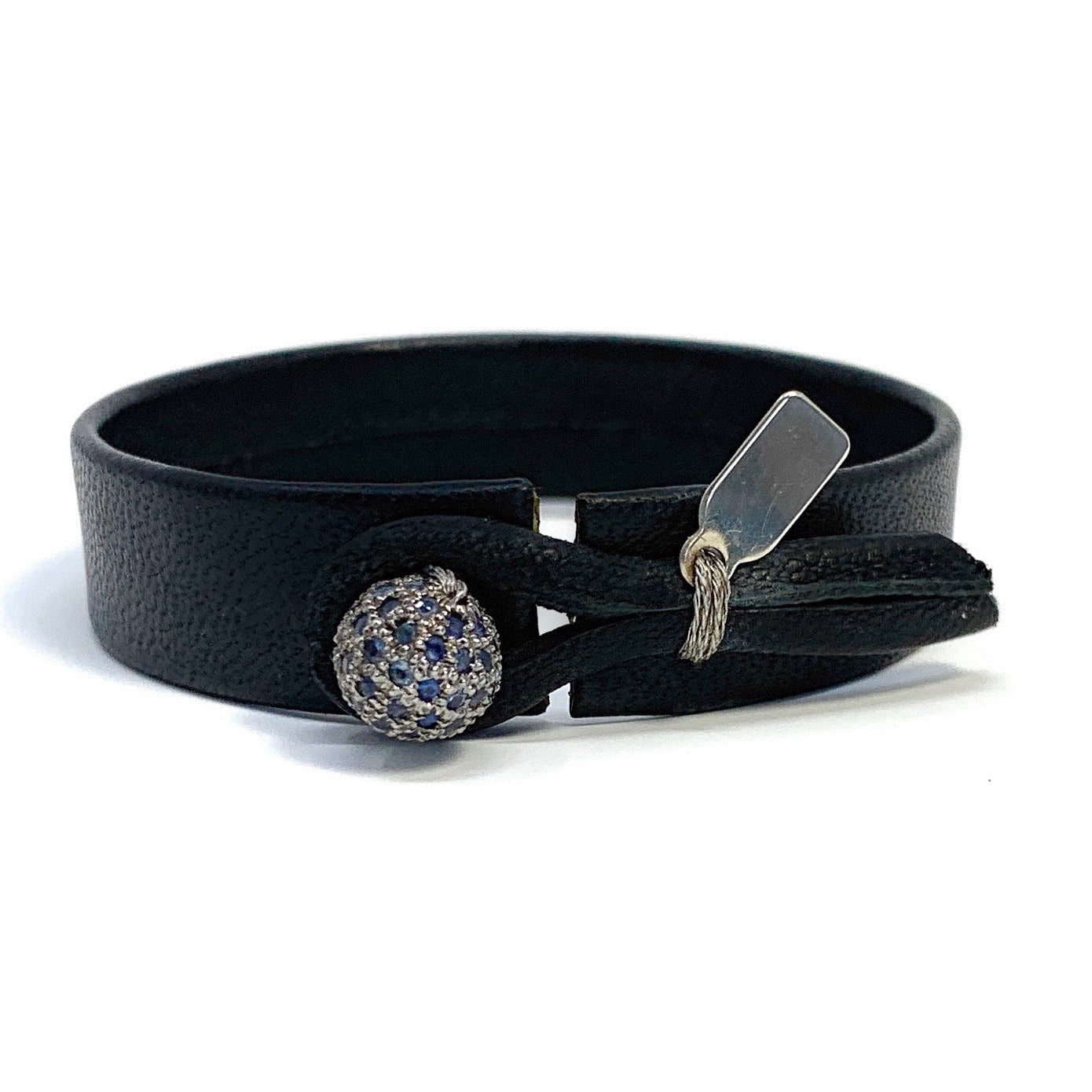 Close-up of sapphire ball on The Denim single wrap leather bracelet by Boussidan


