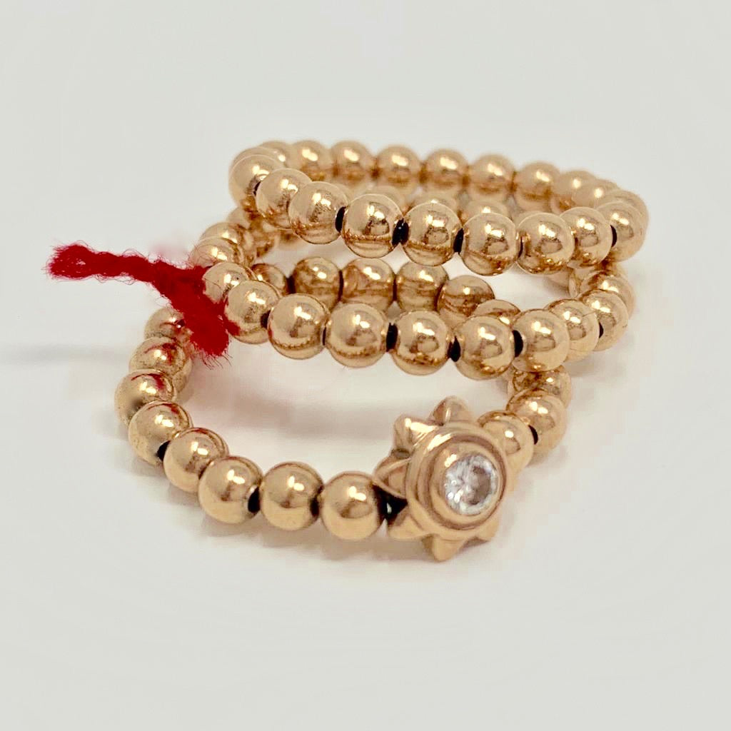 14k gold 3mm beads with diamond starburst closeup by Boussidan