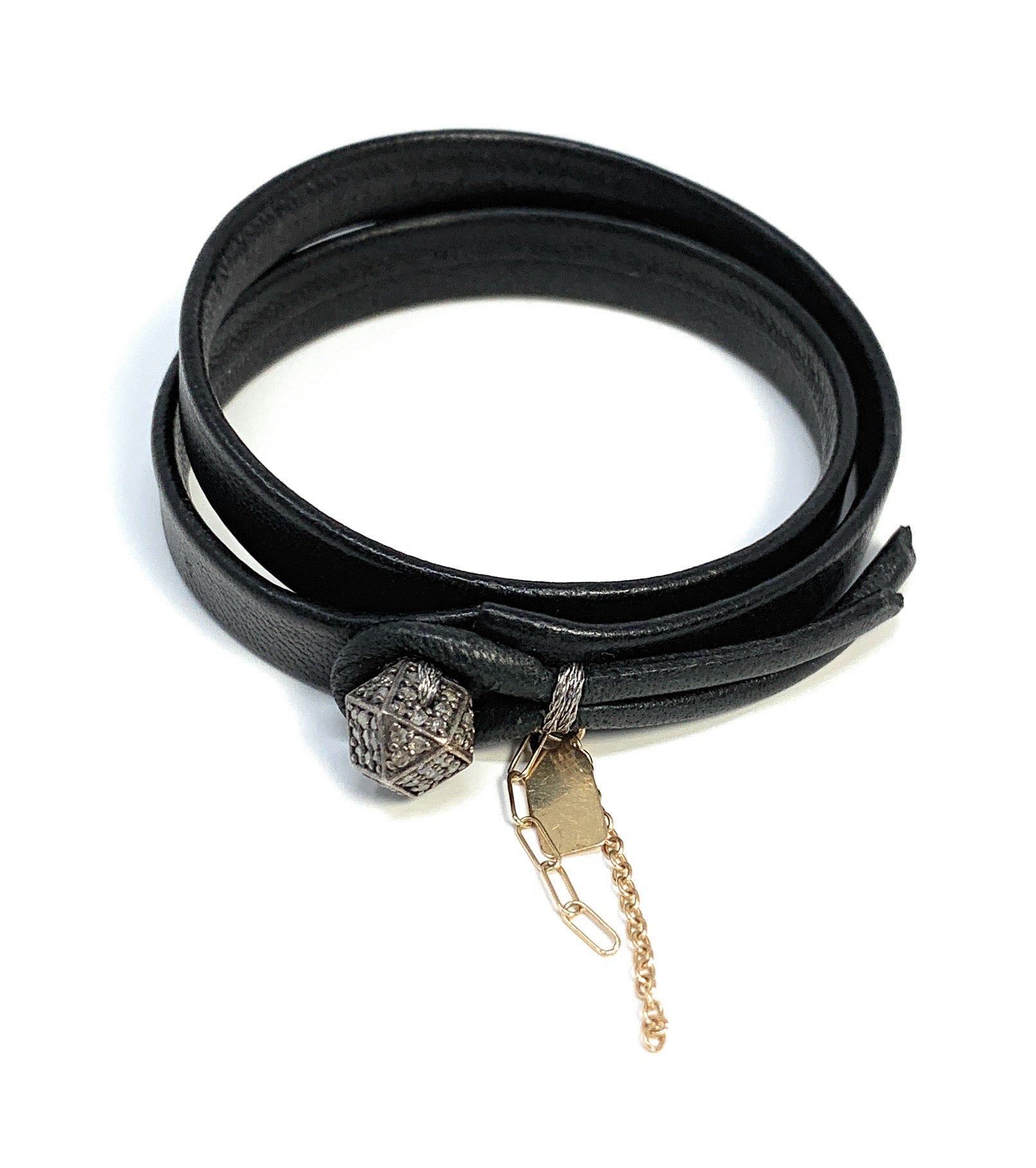 Close-up of sterling silver geometric diamond ball on The Hexane leather bracelet