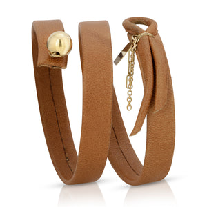 Close-up of 14k gold ball on The Lumiere leather bracelet