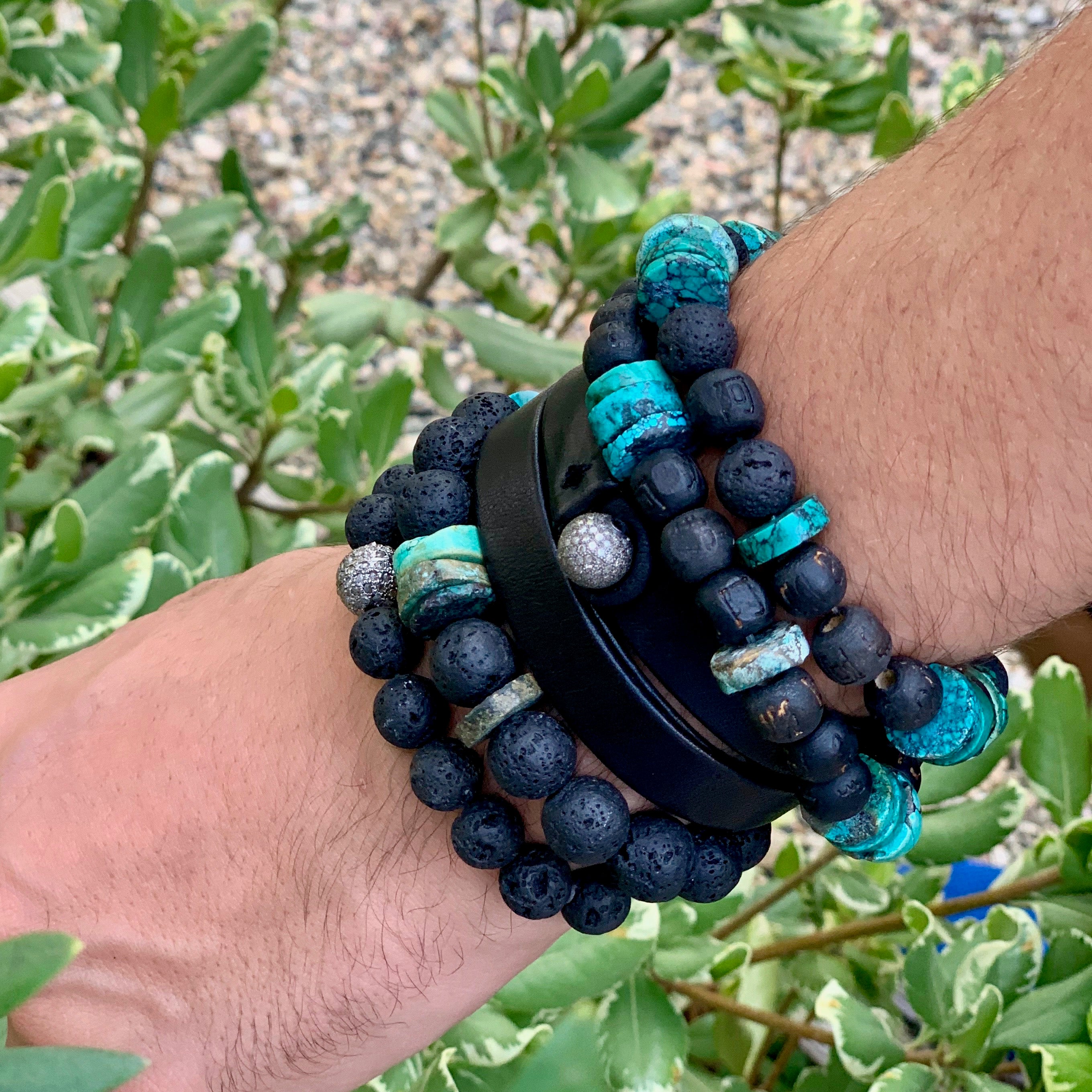 The Titan triple wrap leather bracelet on wrist, showcasing unisex luxury by Boussidan